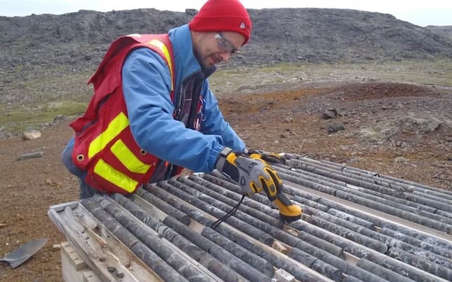 Geologist examining rock sample